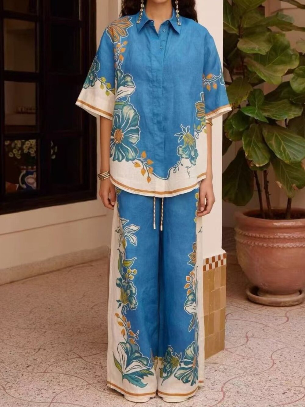 Zimmermann Blue and white shirt two-piece set.